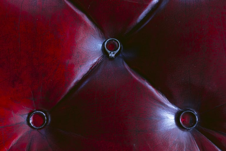 A close up of a red leather chair at the Merewood Country House Hotel.