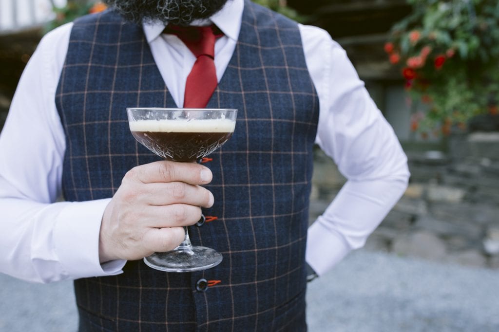 Man Standing with Drink Front Facing Portrait Shot Session