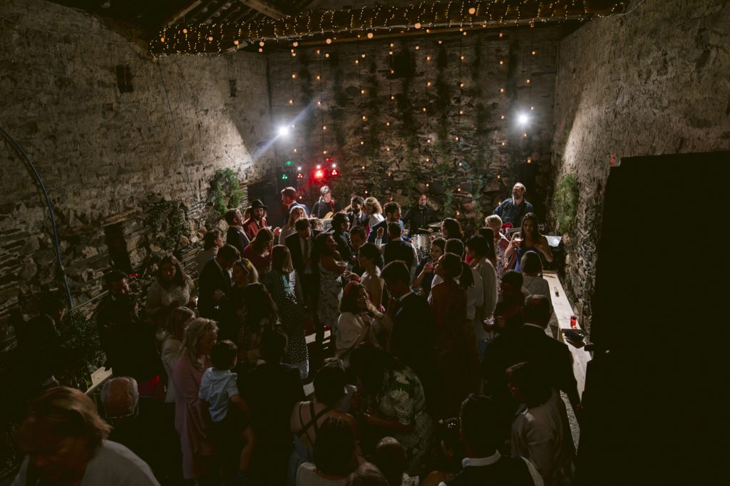 Overhead Portrait Shot of all Guests, Bride and Groom in Main Hall