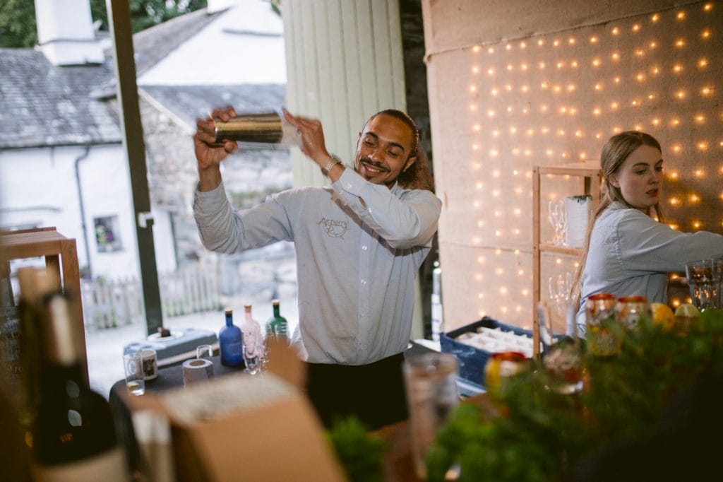 Man Holding Signed Guest book Portrait Session