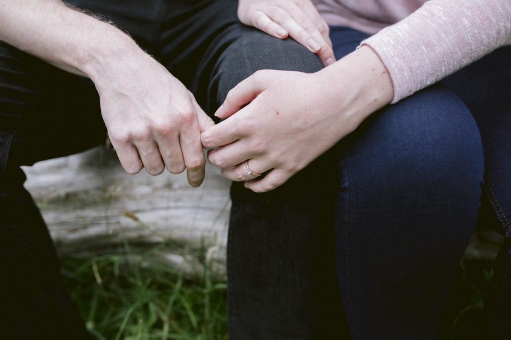 Couple Hands Embraced Together at Ennerdale Water