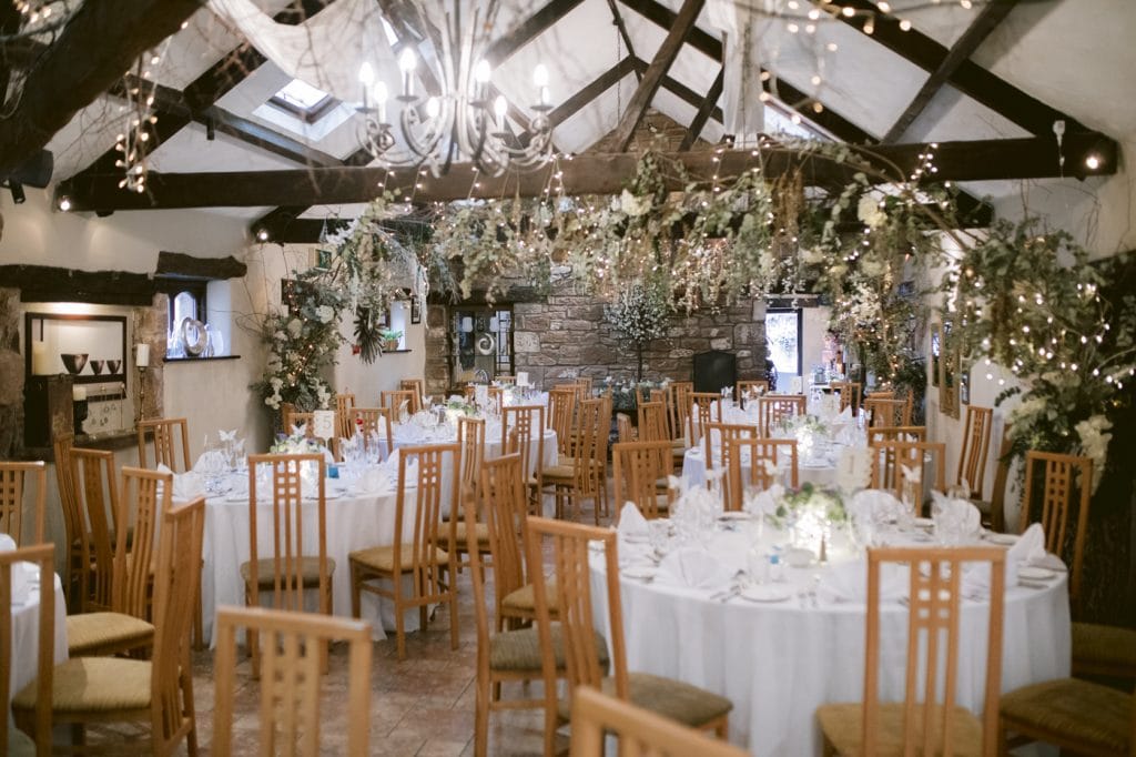 A Dalston Church wedding reception set up in a barn.