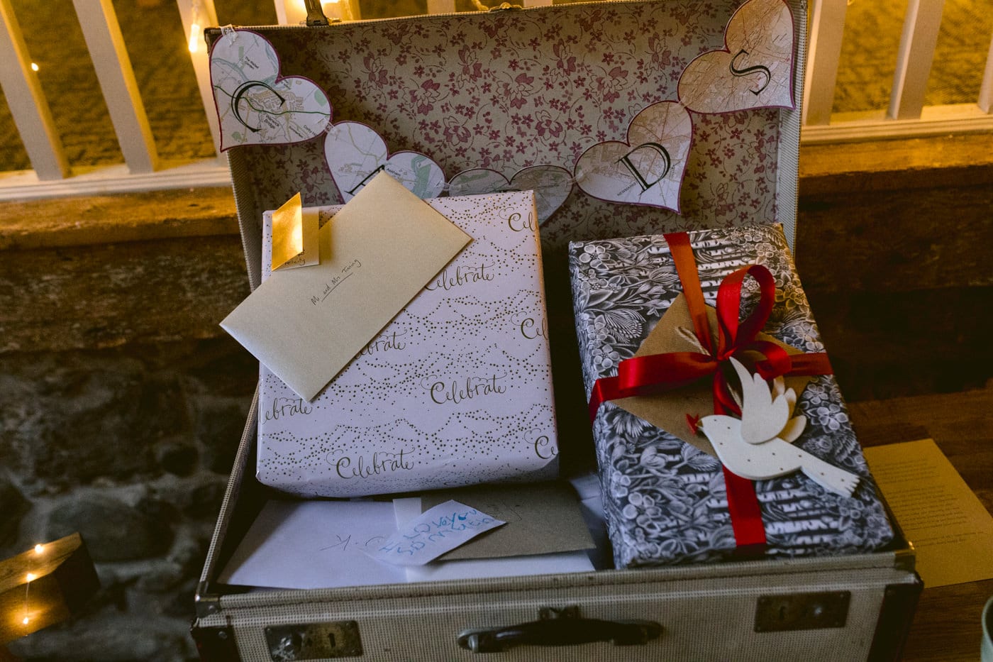 A table adorned with gifts and cards at Askham Hall.