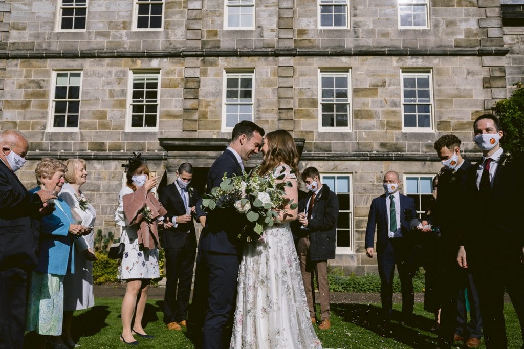 confetti throw over bride and groom at Hexham House