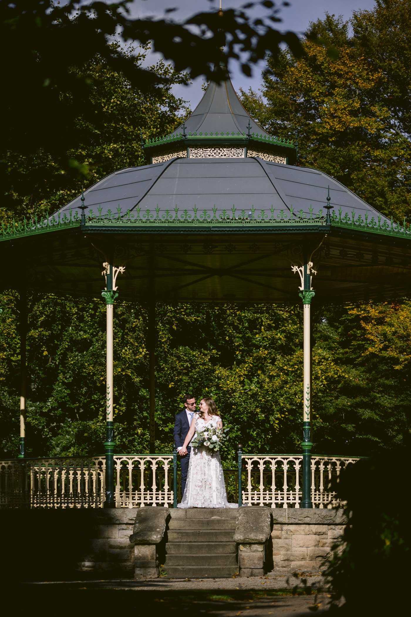 A Hexham House wedding with a bride and groom standing in front of a gazebo.